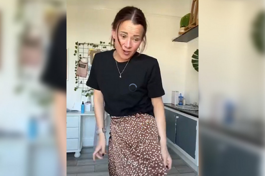 UŽIVALA JE NA VEČERI, NE SLUTEĆI ŠTA JOJ SE SPREMA: Kad je ustala, gosti su šokirano gledali u njenu pozadinu (VIDEO)