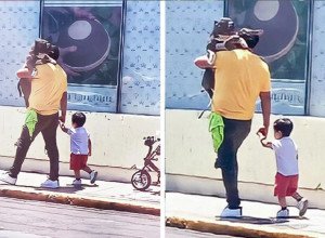 SNIMAK OVOG OCA IZAZVAO JE BURNU DEBATU: U naručju drži psa, a dete šeta pored njega, javnost u neverici pred ovom scenom(VIDEO)