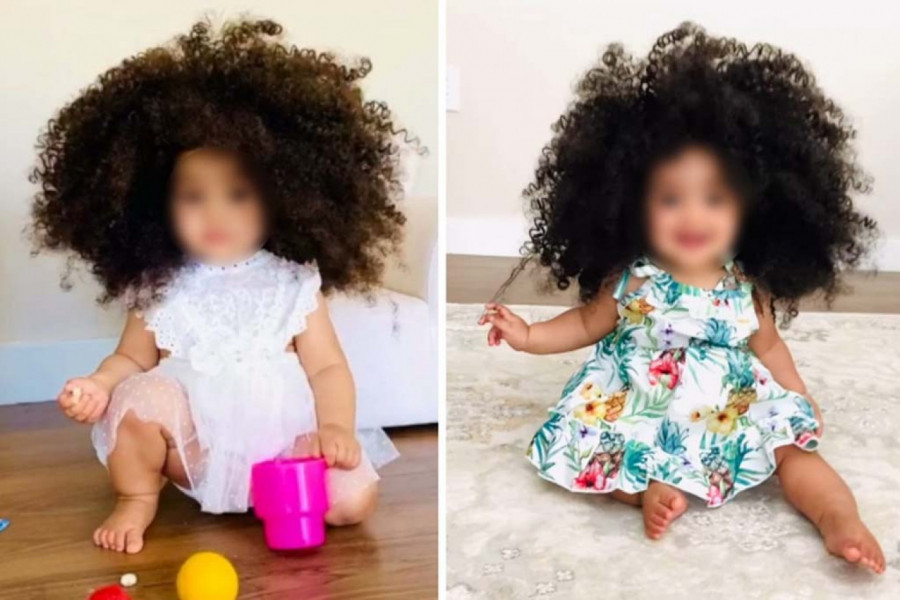 OVAKVU BEBU NIKAD NISTE VIDELI: Lokne bujaju na sve strane, izgleda kao lutka! (VIDEO)