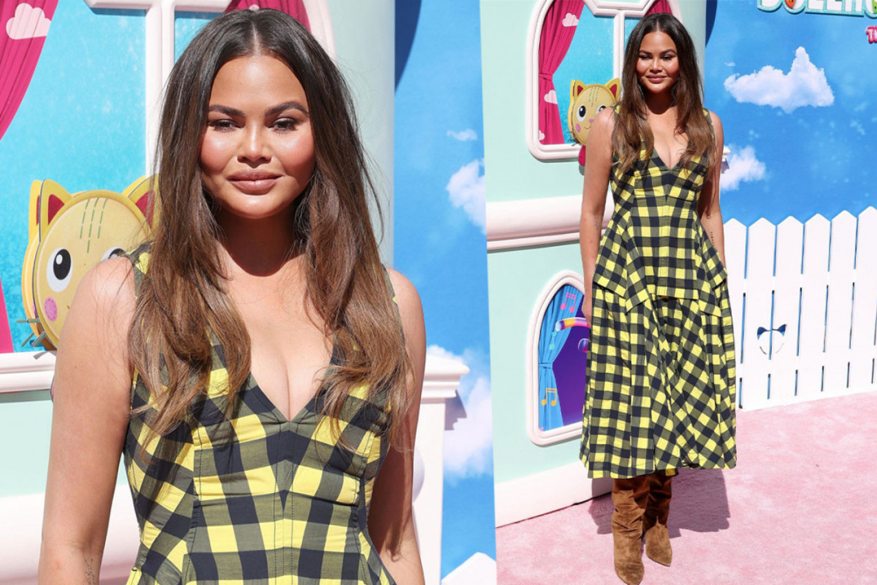 Krisi Tajgen ponela upečatljivu žuto-crnu haljinu na braon čizme, kako vam se dopada?